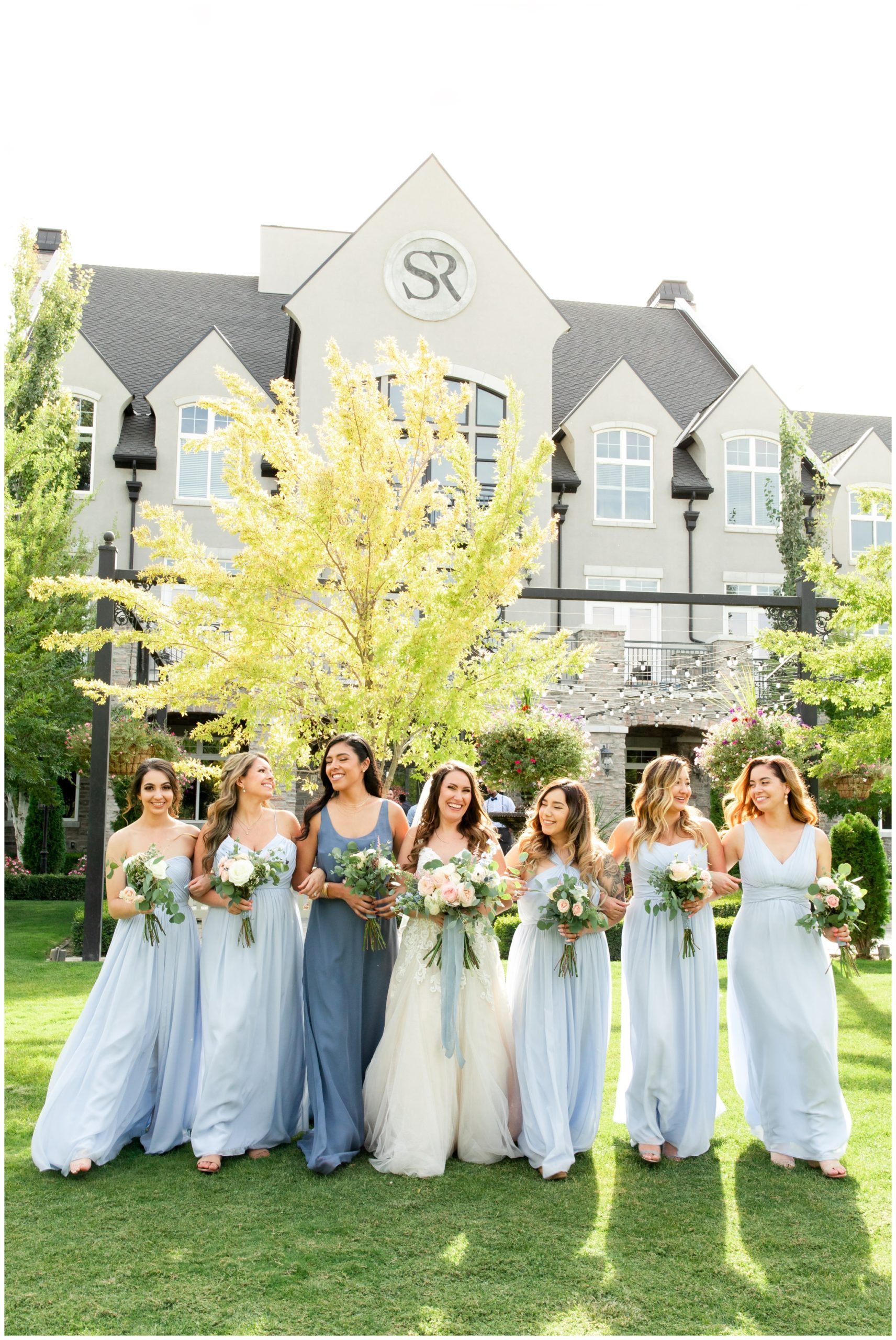 Bridesmaids wearing light blue dresses at wedding in Utah