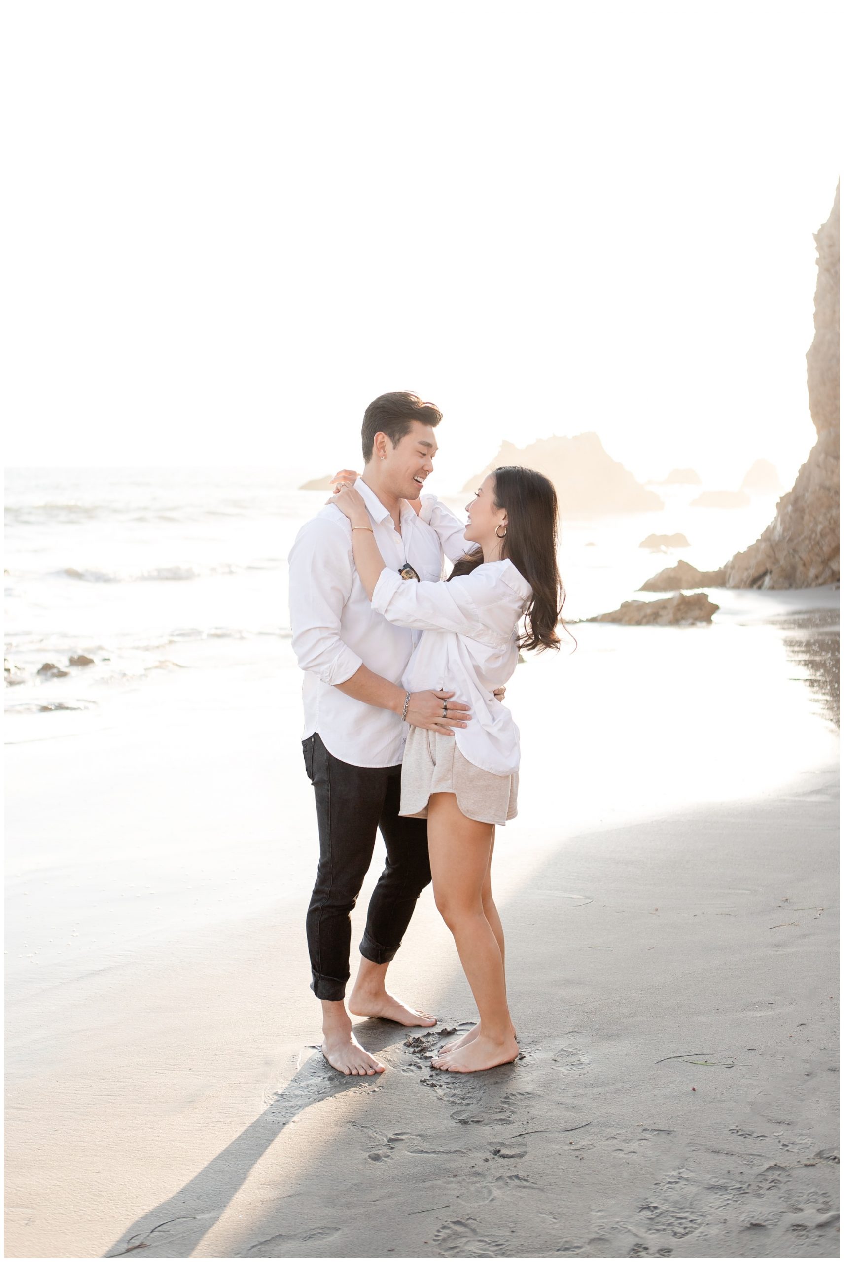 Engagement pictures on beach during sunset. CA