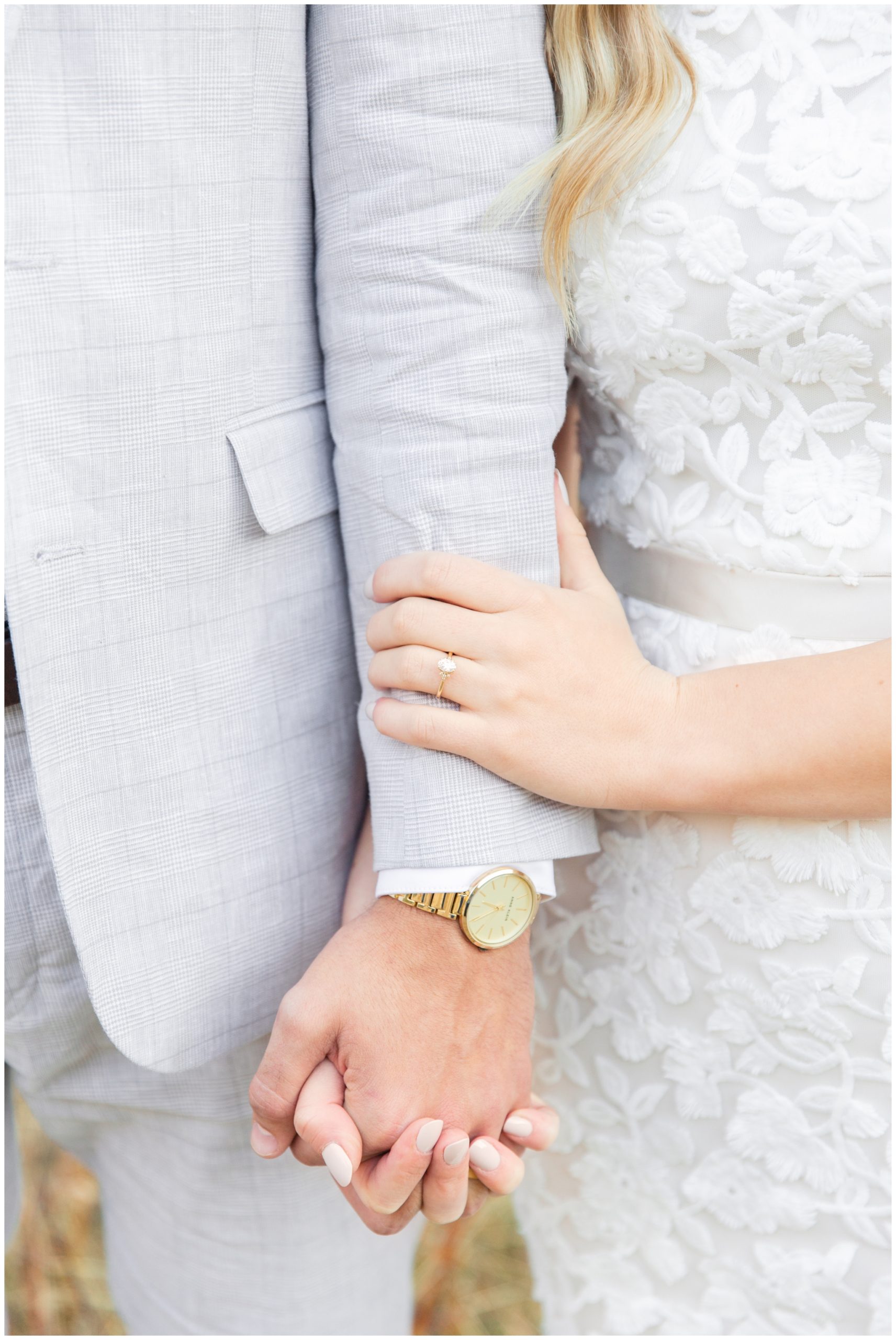 Bride and Groom holding hands