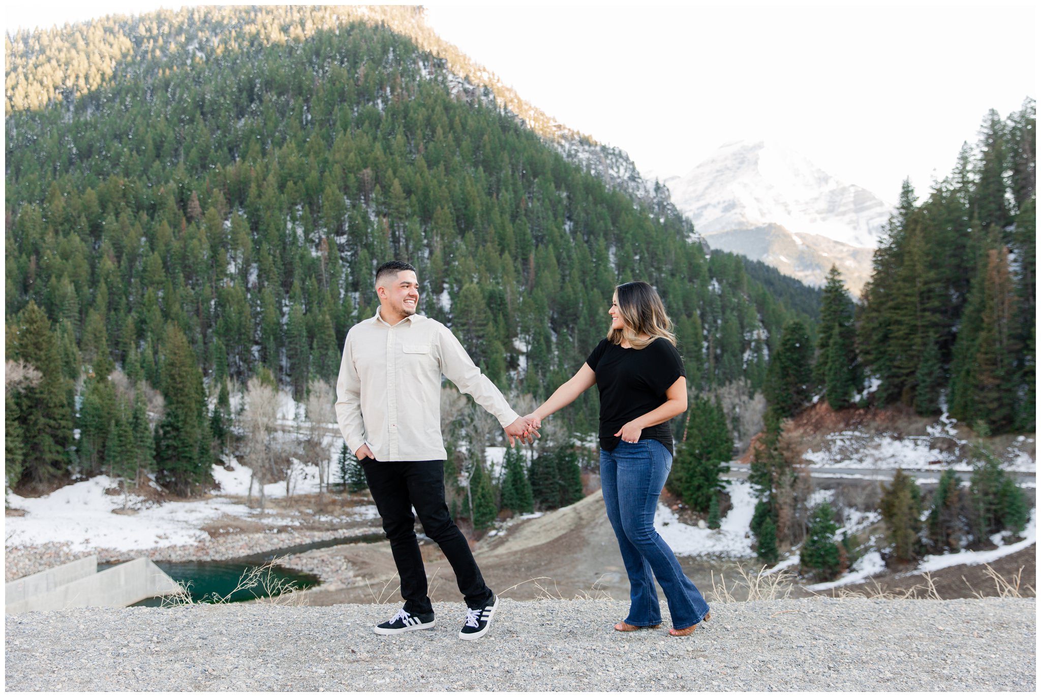 Couple holding hands in the mountains of Utah