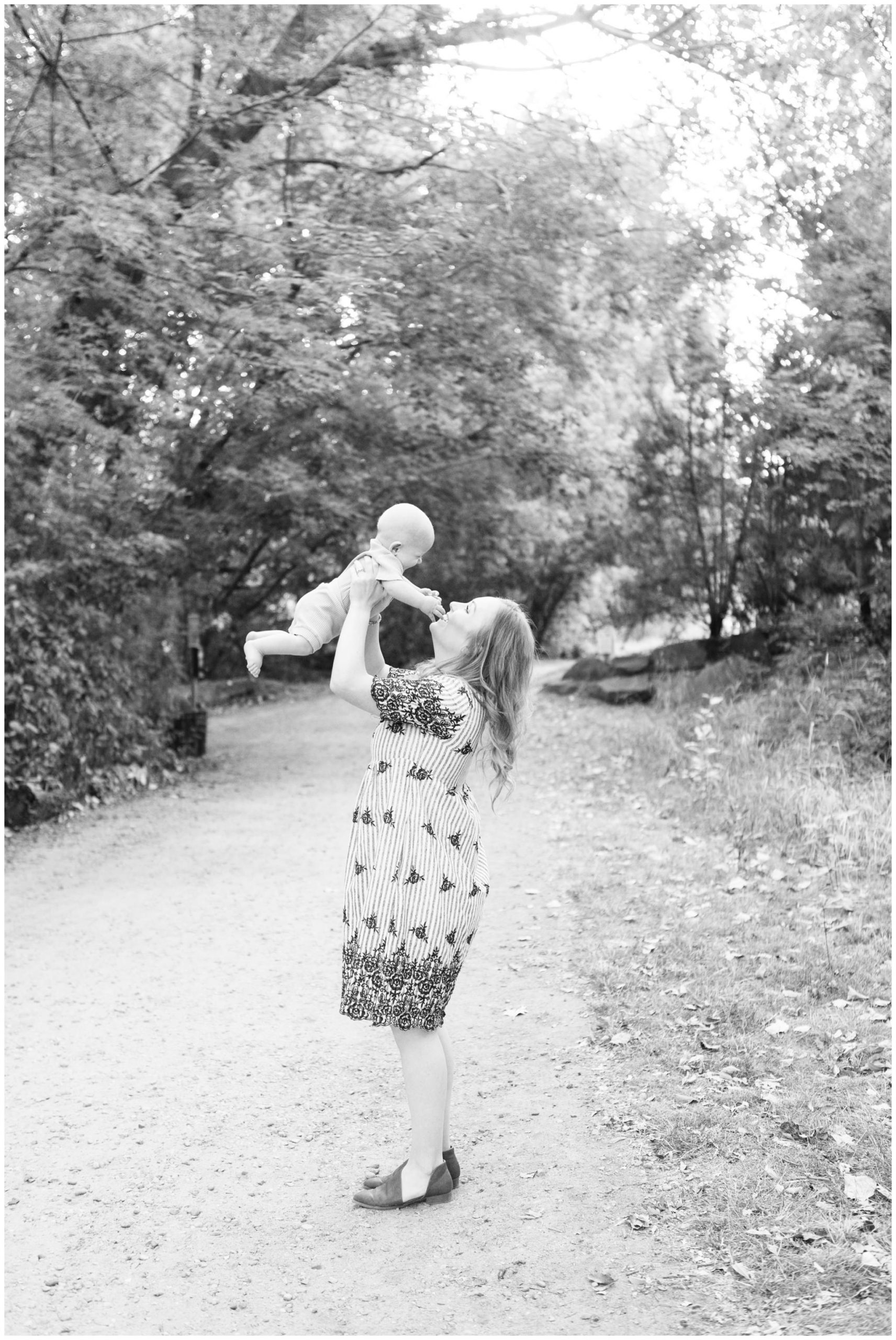 Mom holding baby up for pictures in Lubbock