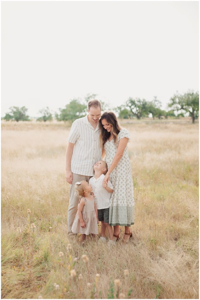 Kids looking at parents while taking pictures in Lubbock Texas